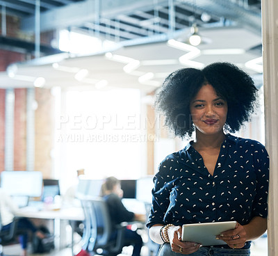 Buy stock photo Shot of a young female designer working in her office