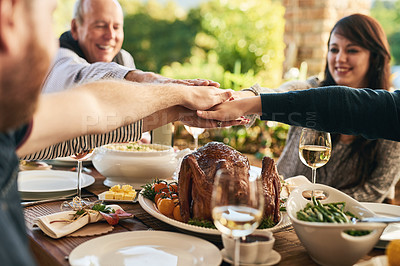 Buy stock photo Hands together, food and family celebrate with dinner, party and support, trust and feast for holiday or anniversary celebration. 