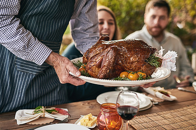 Buy stock photo Thanksgiving, table and roast meat at party for dinner, lunch or supper at an outdoor event. Christmas, gathering and chef serving people a luxury meal or feast for festive xmas holiday dining party.