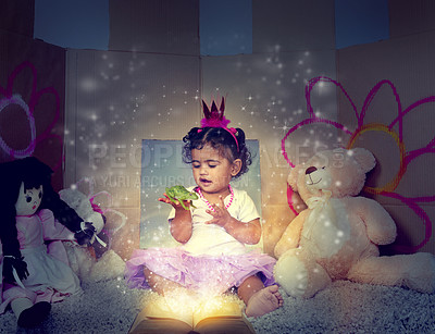 Buy stock photo Little girl, book and reading with fairy tale for princess and frog in make belief, dream or imagination at home. Happy child, toddler or baby with story or pixie dust for fantasy or cosplay at house