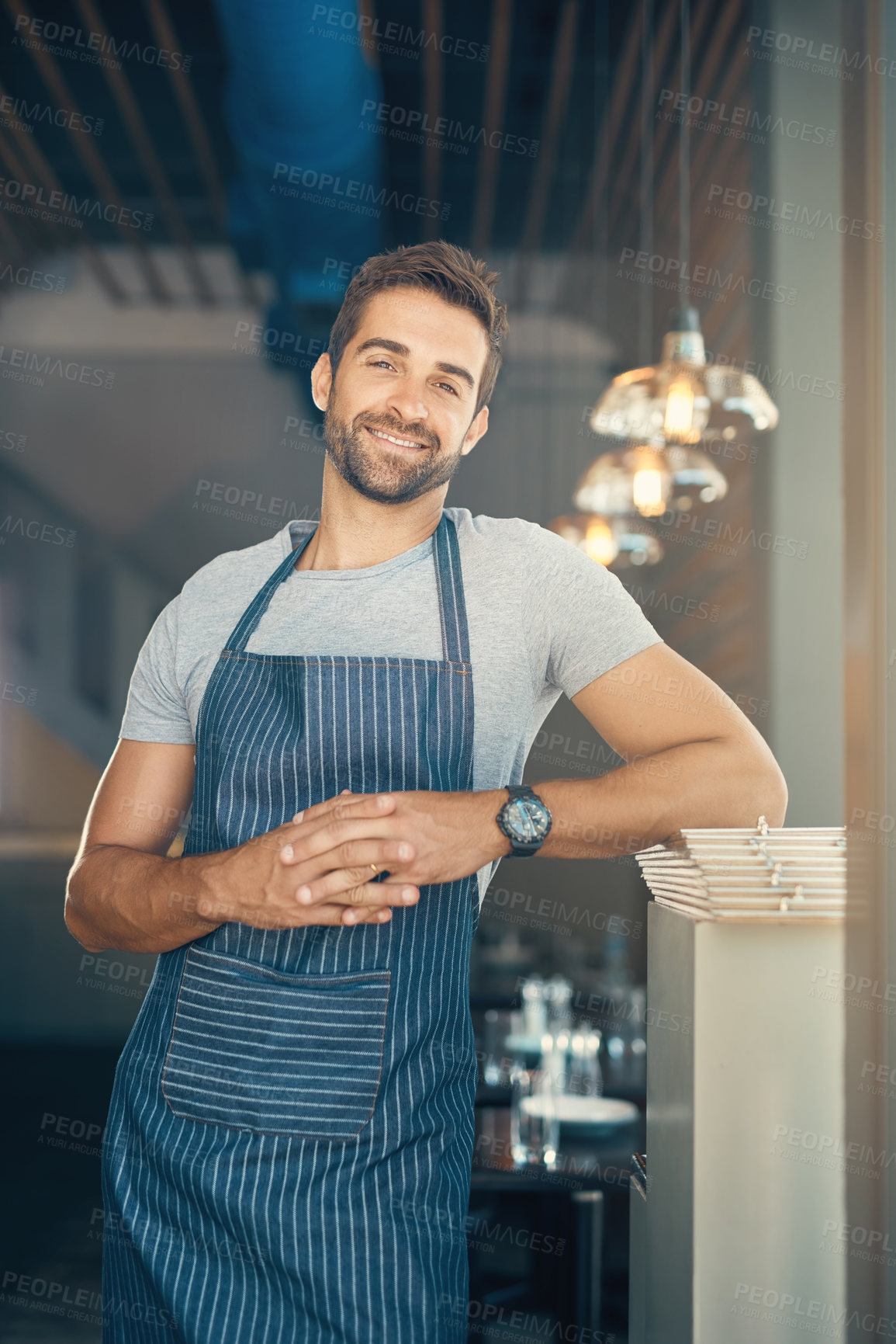 Buy stock photo Portrait, business and man in cafe, apron and waiter with confidence, career ambition and hospitality. Face, happy person and entrepreneur with service industry, professional and server in restaurant