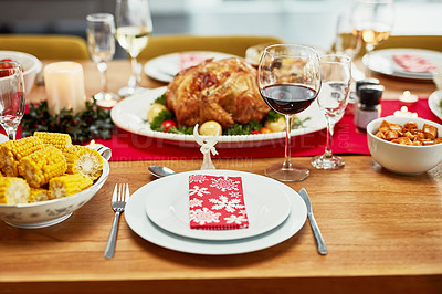 Buy stock photo Christmas, food and plate on table in home for dinner party, celebration and family or social event. Closeup of feast, lunch and gourmet meal for holiday, festive eating and Thanksgiving with wine