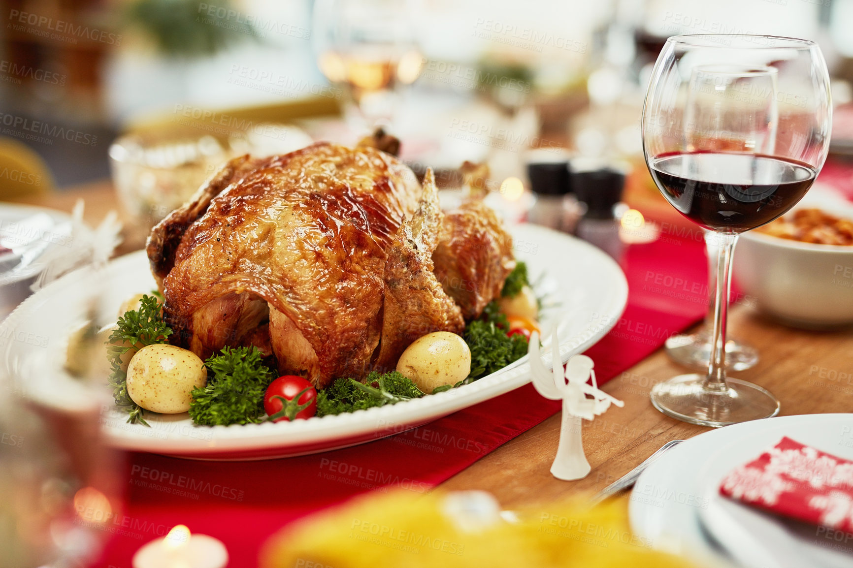 Buy stock photo Thanksgiving, food and turkey on table in home for dinner party, celebration and family or social event. Closeup of feast, lunch and gourmet meal for holiday, festive eating and Christmas with wine