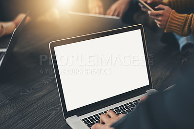 Buy stock photo Shot of an unrecognizable person using a laptop in the office