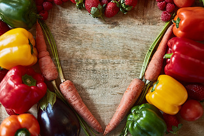 Buy stock photo Cropped shot of fresh produce forming a heart shape on a wooden table