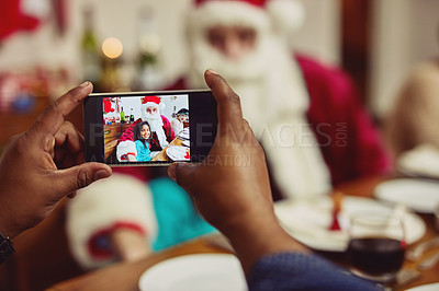 Buy stock photo Closeup shot of a person taking a photo during Christmas