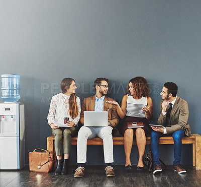 Buy stock photo Group of business people at a job interview at a startup company with copy space. Corporate businesspeople sitting and waiting in line for a meeting with human resources and applying for work