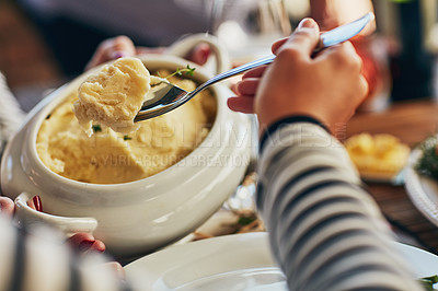 Buy stock photo Cropped shot mash being served during a feast at a dining table