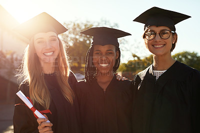 Buy stock photo Portrait, students and graduation pride outdoor, diploma celebration and hug for support. People, friends and certified together for university success, diversity and certificate achievement goals