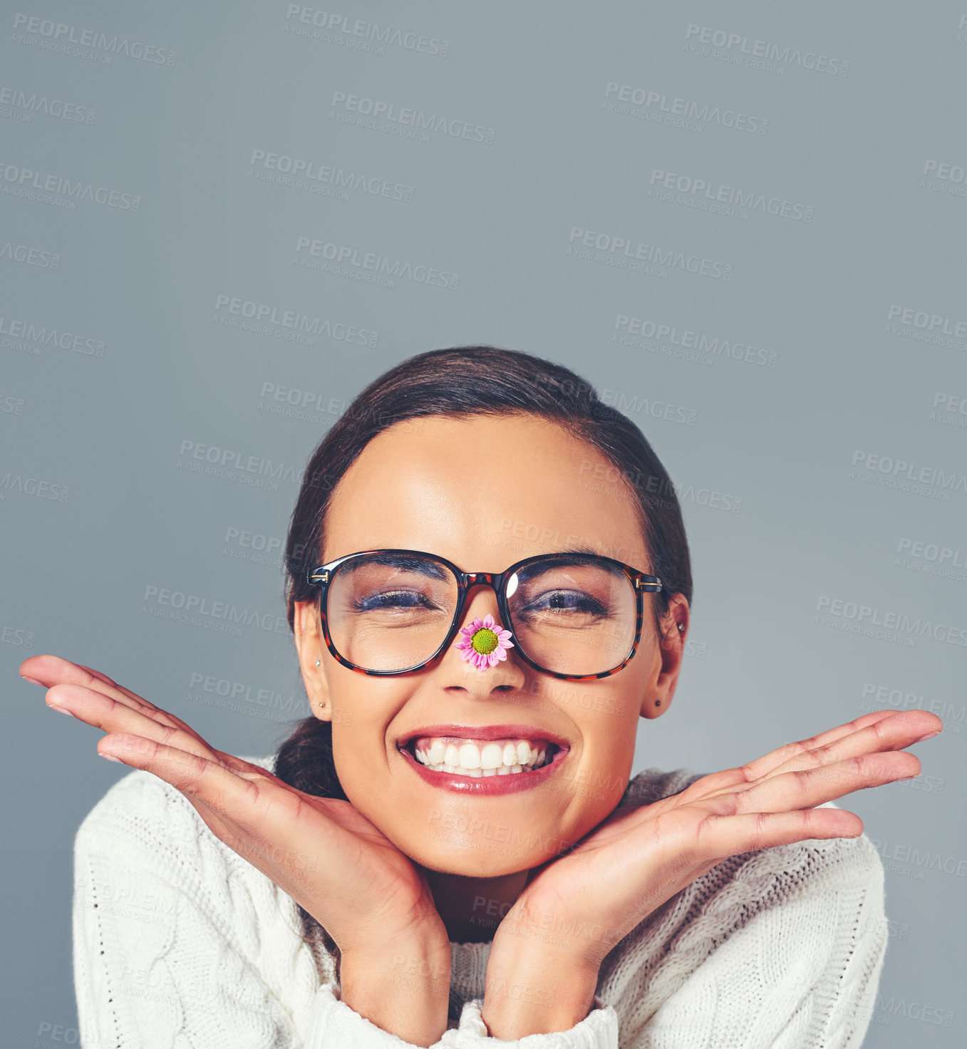 Buy stock photo Woman, eyewear and eye care in studio portrait, flower and sustainable frames for optometry. Female person, optical insurance and proud for eco friendly healthcare, medical lens and gray background