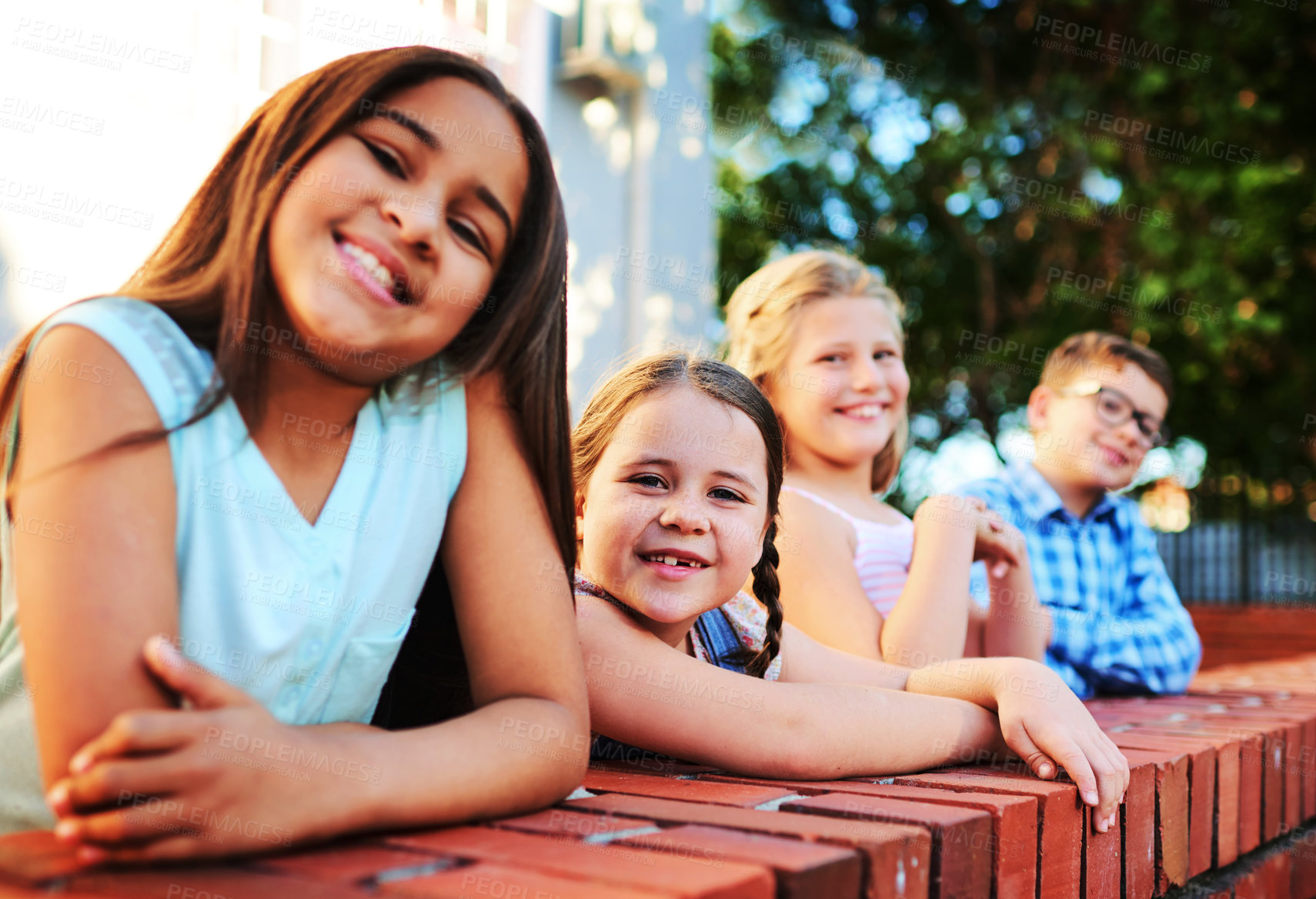 Buy stock photo Portrait of a group of young children playing together outside