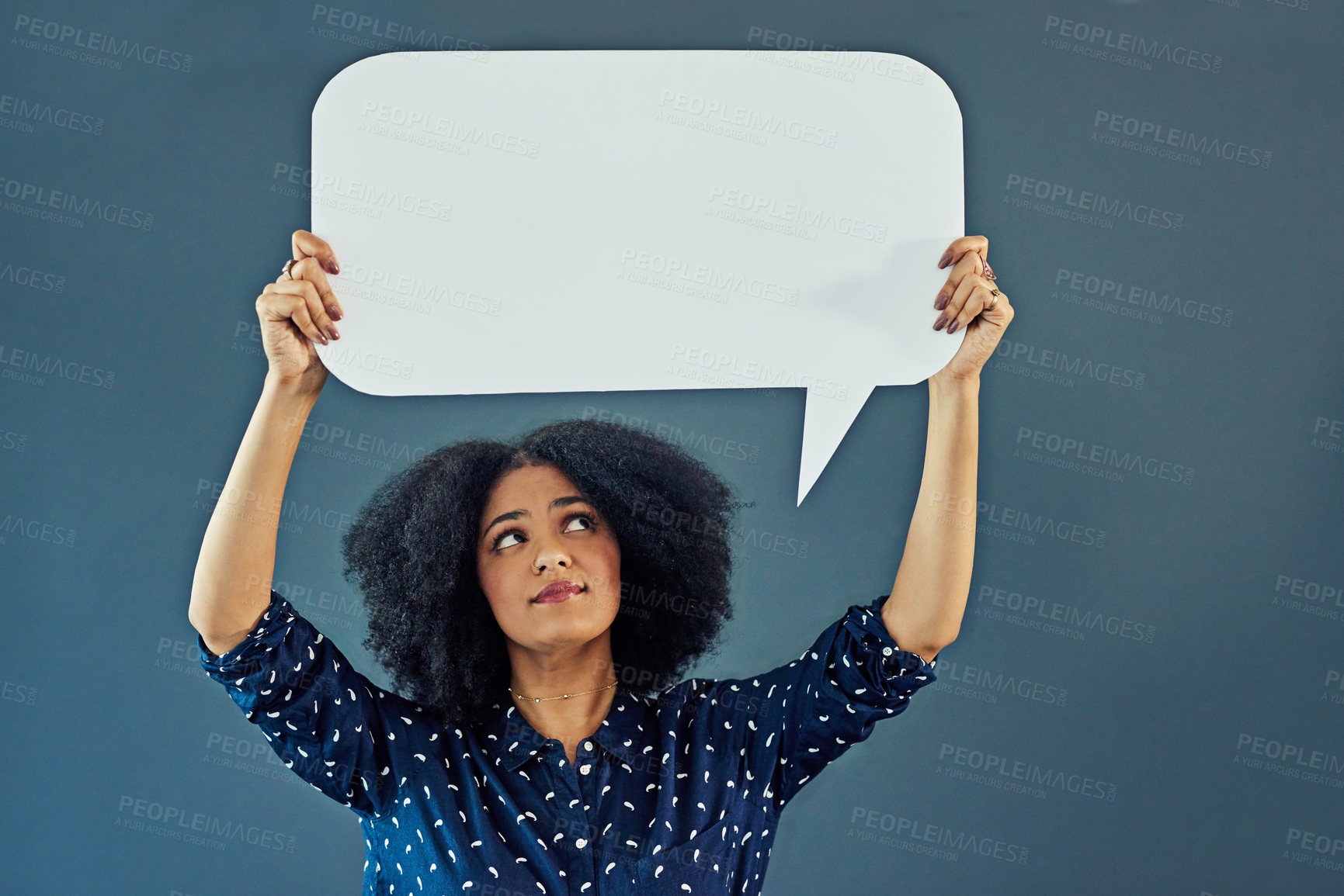 Buy stock photo Mockup, speech bubble and woman in studio with banner for news, social media or advertising on blue background. Space, billboard and female person with paper, poster and branding promotion or launch