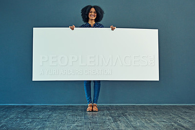 Buy stock photo Banner, mockup and portrait of happy woman in studio with billboard for news, social media or advertising on blue background. Space, paper and girl smile with poster, sign and branding promotion