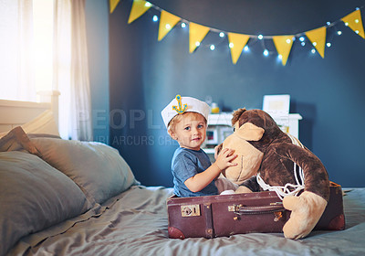 Buy stock photo Sailor, bedroom and portrait of child with teddy bear for playful, fun and imagination at home. Boy kid, happy and bag with stuffed animal in house for fantasy adventure,  costume and pretend voyage