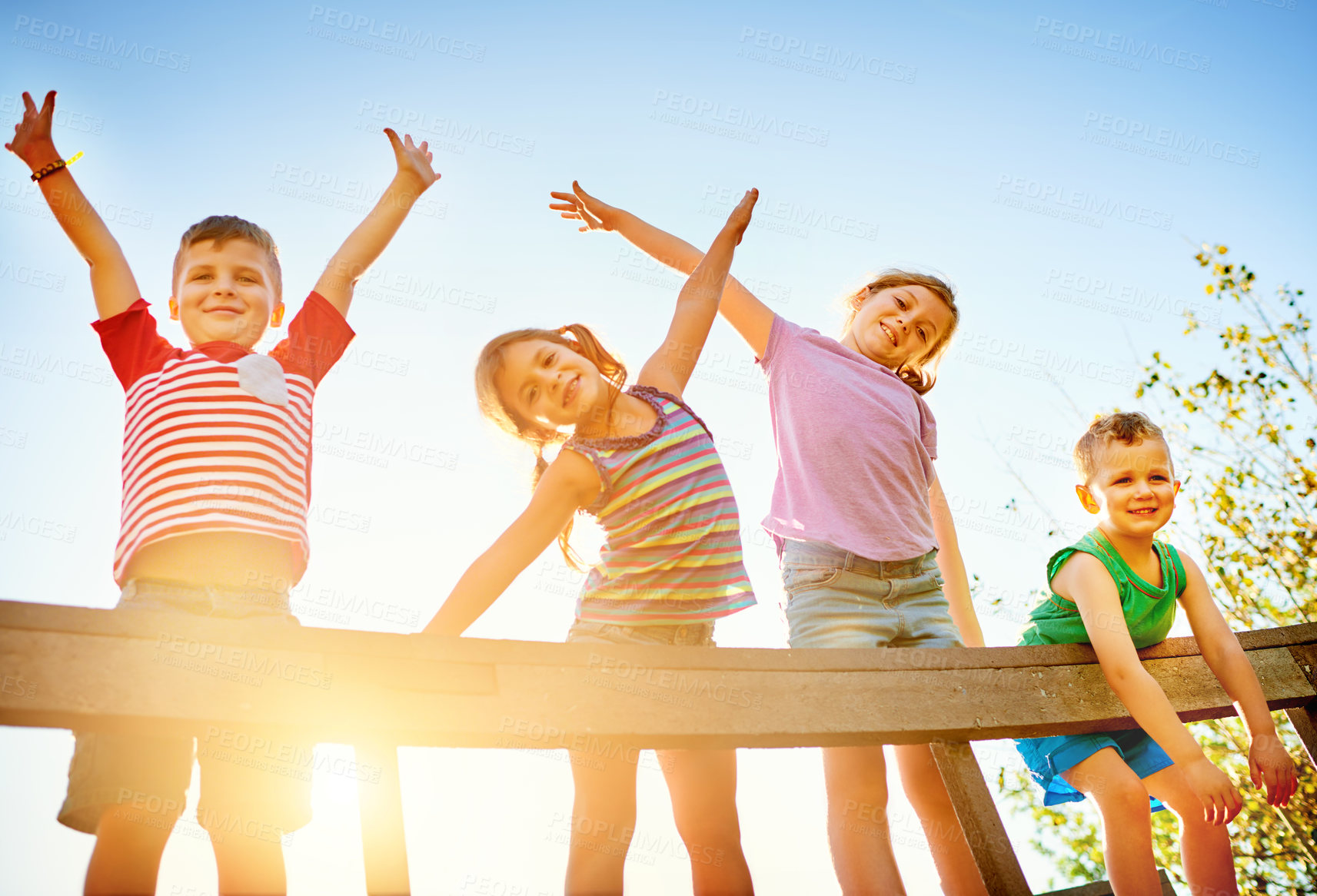 Buy stock photo Friends, children and portrait with hands up outdoor, park and garden by wooden bridge in nature. Happy kids, boys and girls with airplane gesture, playful and bonding together for development