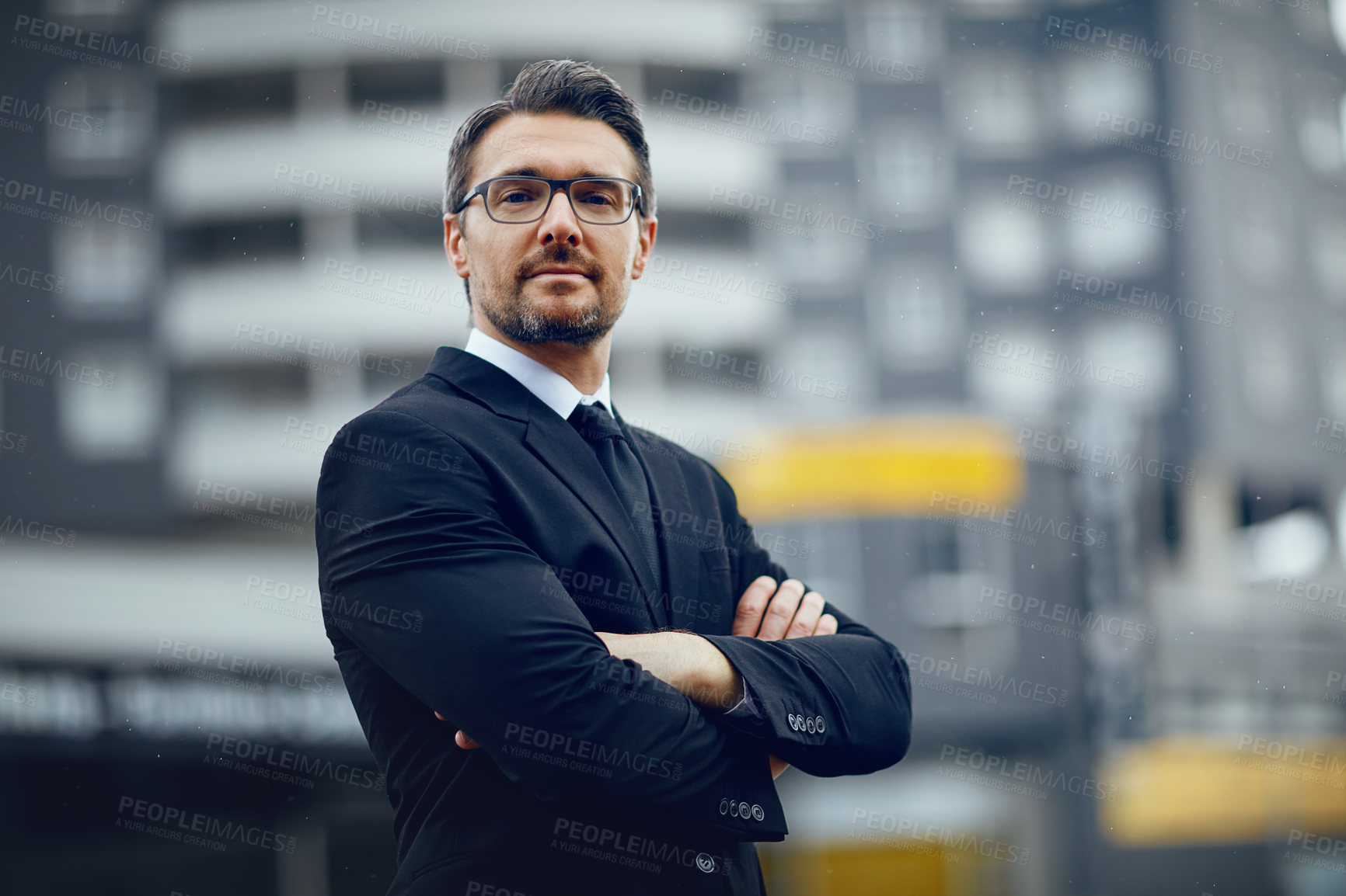 Buy stock photo Portrait of a mature businessman standing in the city