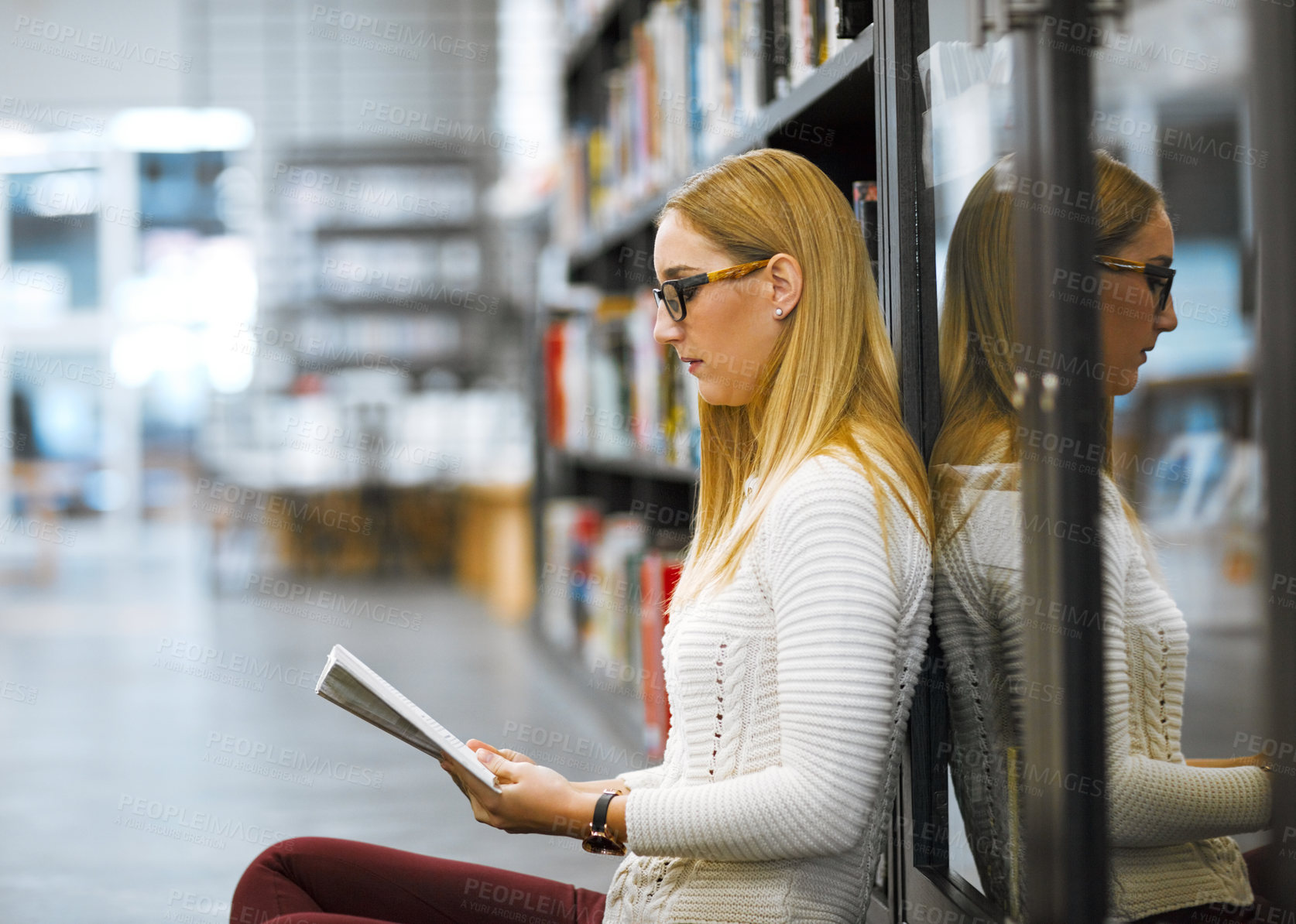 Buy stock photo Studying, book and reading with woman in library for scholarship, knowledge and learning. Education, university and exam with person research on college campus for project, academy or school resource