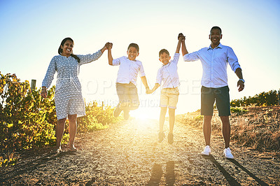 Buy stock photo Family, children and jumping on vacation, holiday or travel in Tuscany for bonding, memory and support. Woman, man and kids in outdoor for celebration, growth and development with flare in Italy