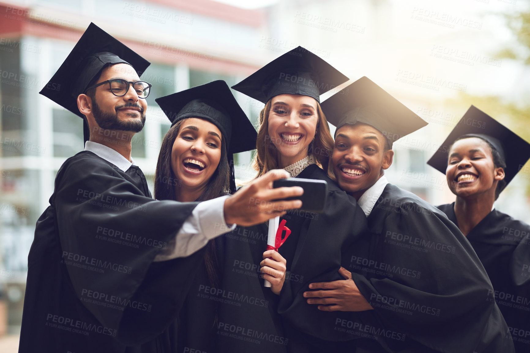 Buy stock photo Graduation, university and selfie of students with smile for celebration, achievement and success in education. Photography, friends and happy people on college campus with diploma at award ceremony