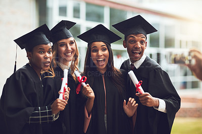 Buy stock photo Graduation, photography and excited students with certificate at celebration for university education. Smartphone, friends and happy people on college campus with digital memory of award ceremony