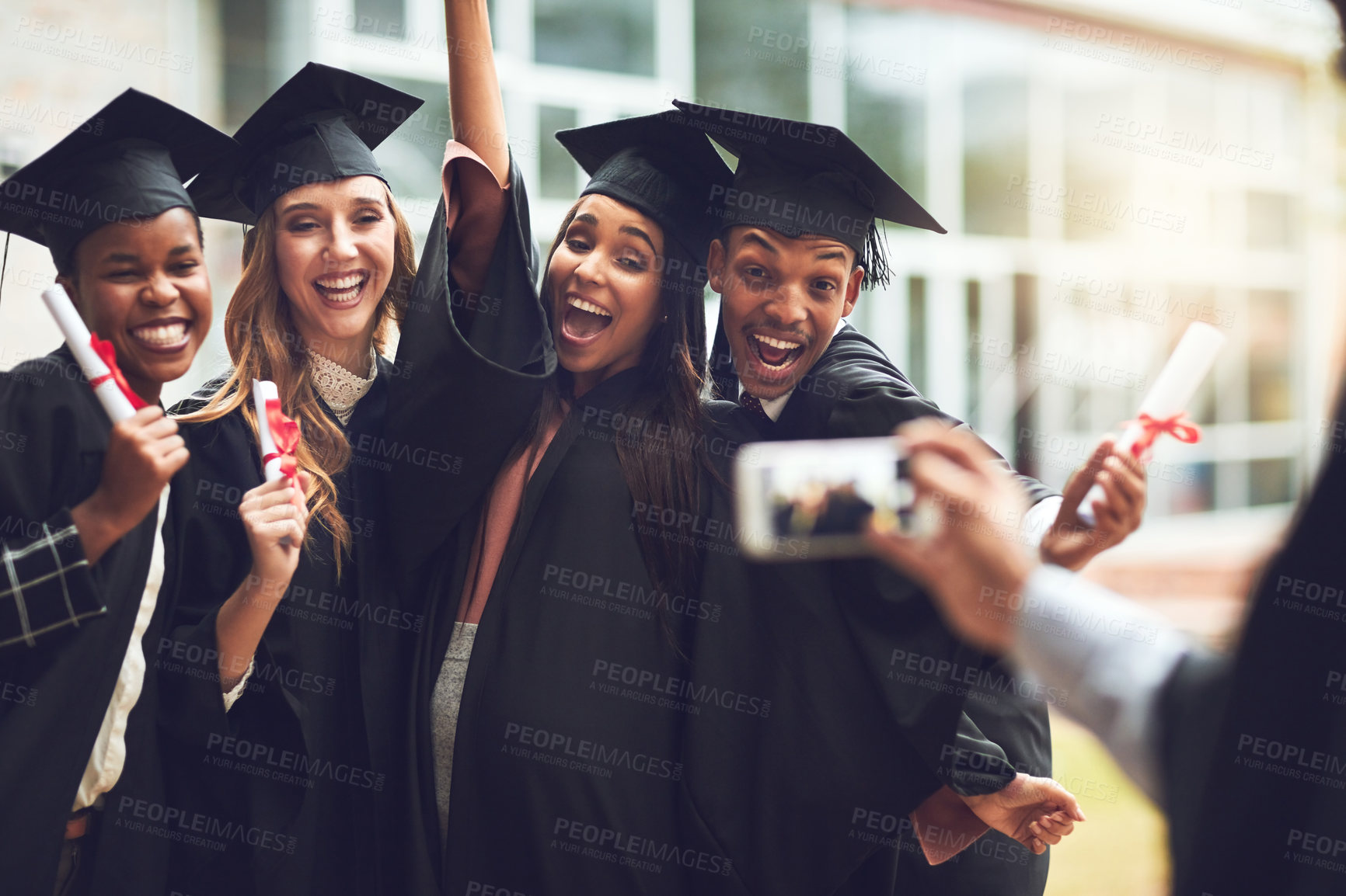 Buy stock photo Graduation, photography and excited students with phone at celebration for university education. Smartphone, friends and happy people on college campus with digital memory of award ceremony on screen