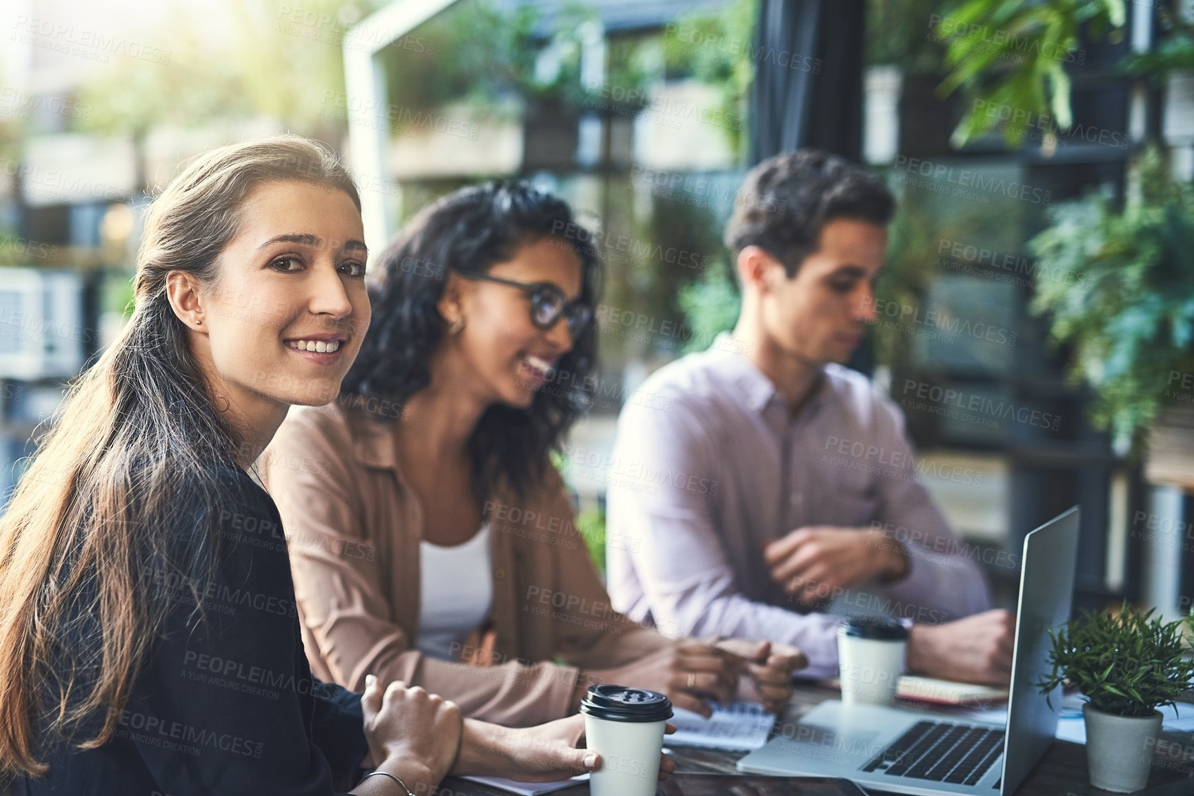 Buy stock photo Business people, coffee shop and portrait of woman in meeting with laptop for planning, discussion and feedback. Creative company, about us and men or research project, conversation and collaboration