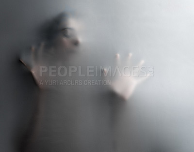 Buy stock photo Cropped shot of an unrecognizable woman trapped behind a hazy film