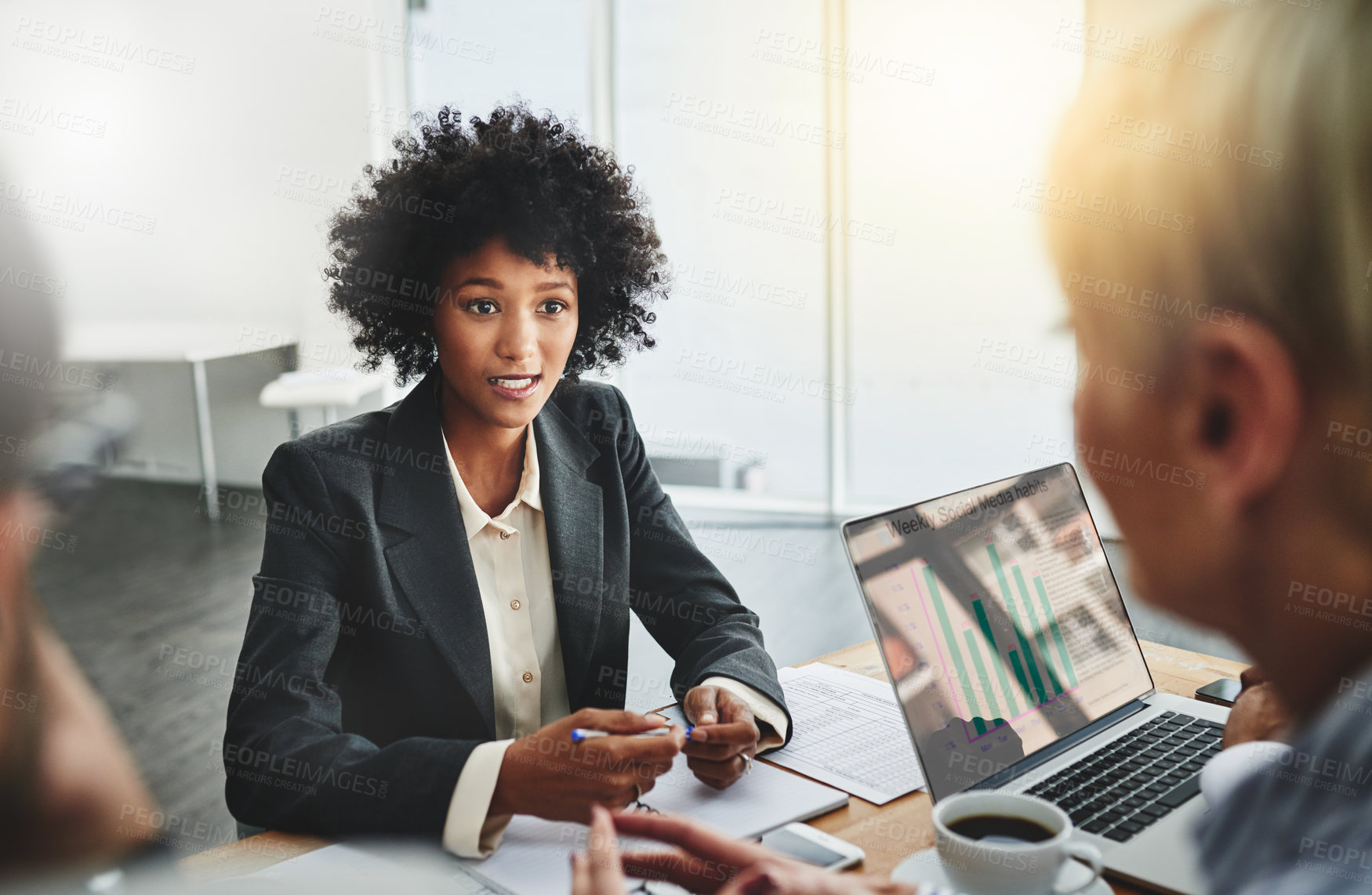 Buy stock photo Shot of a group of businesspeople having a meeting in an office