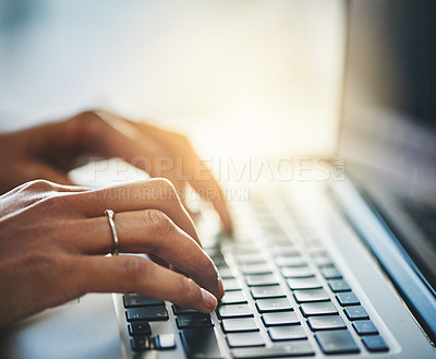 Buy stock photo Closeup shot of an unrecognisable woman typing on a laptop