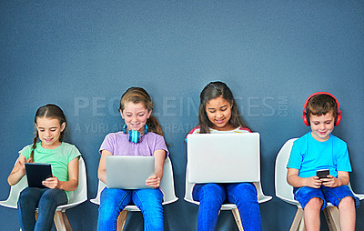 Buy stock photo Study, technology and education with children in studio for online classes, connection and remote learning. Digital portal, virtual school and webinar with students on wall background for mockup