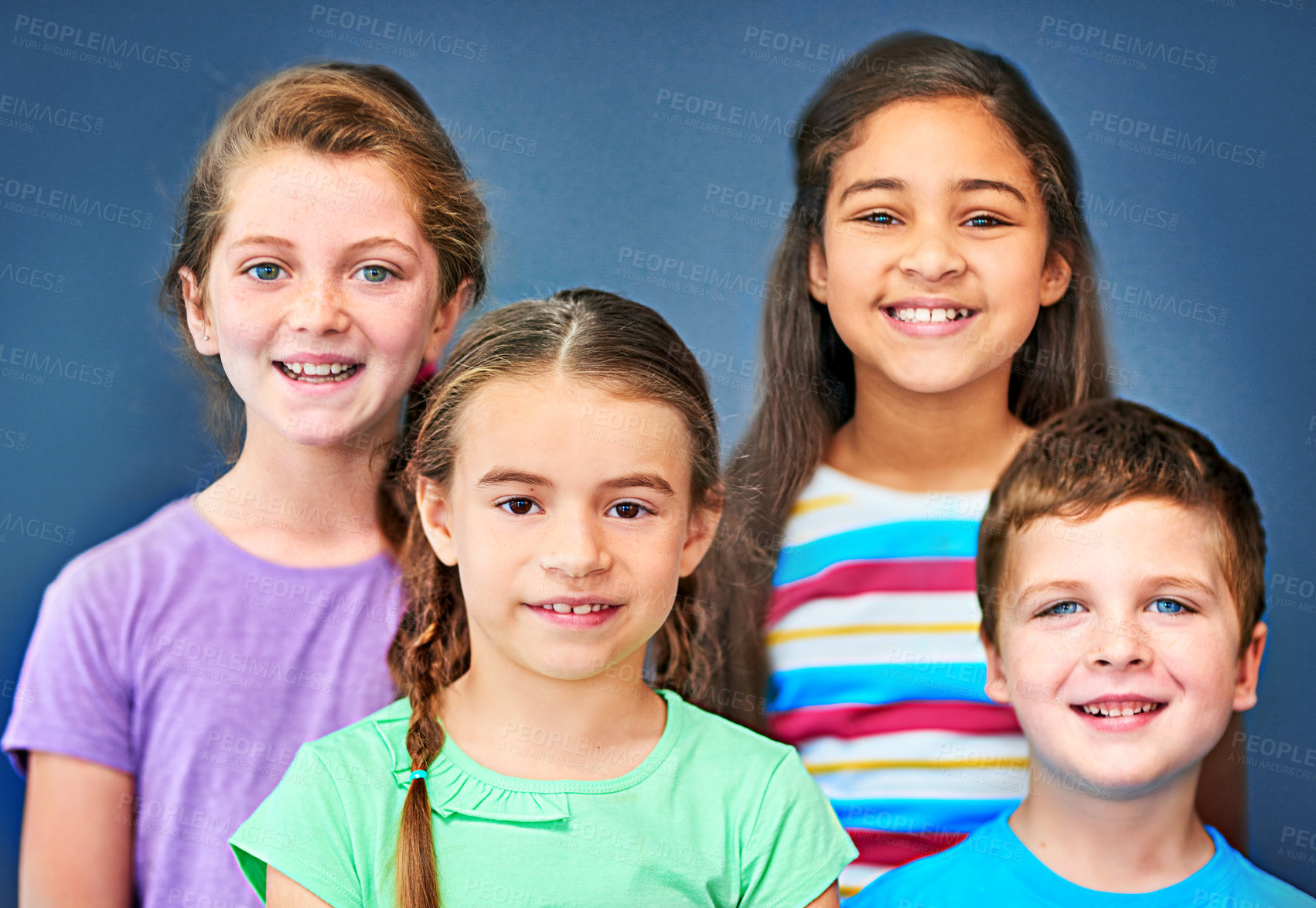 Buy stock photo Friends, happy and portrait of children on blue background for back to school, education and academy. Students, youth and group of kids with smile for learning, scholarship and diversity in studio