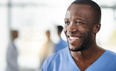 Buy stock photo Shot of a happy young man working as a surgeon in a hospital