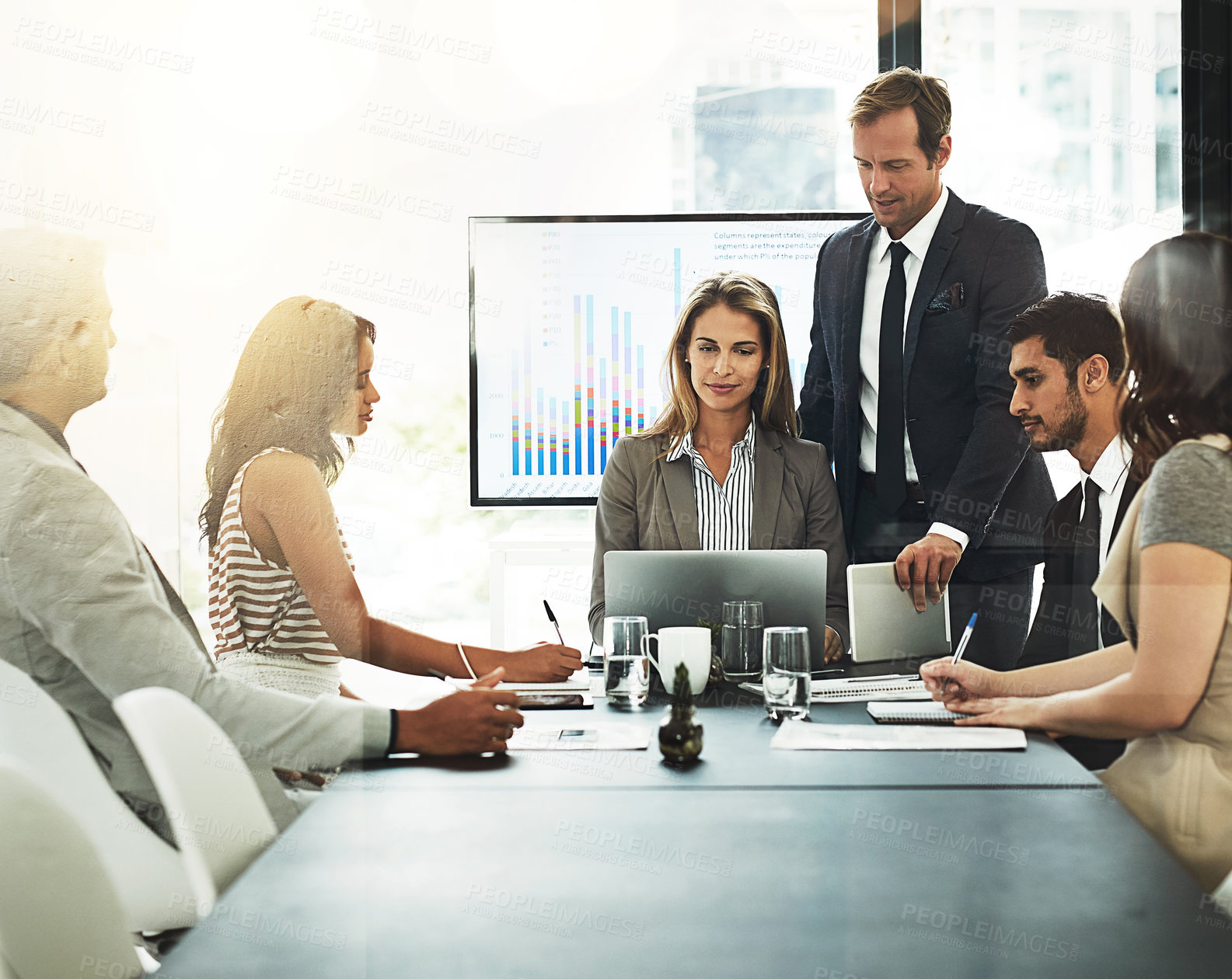 Buy stock photo Shot of corporate businesspeople meeting in the boardroom