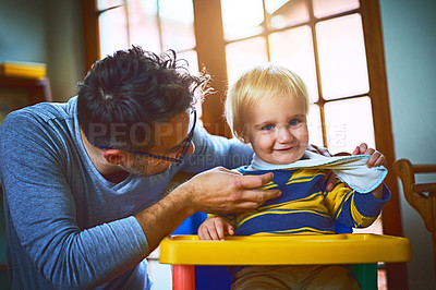 Buy stock photo Cropped shot of a single father tickling his son at home