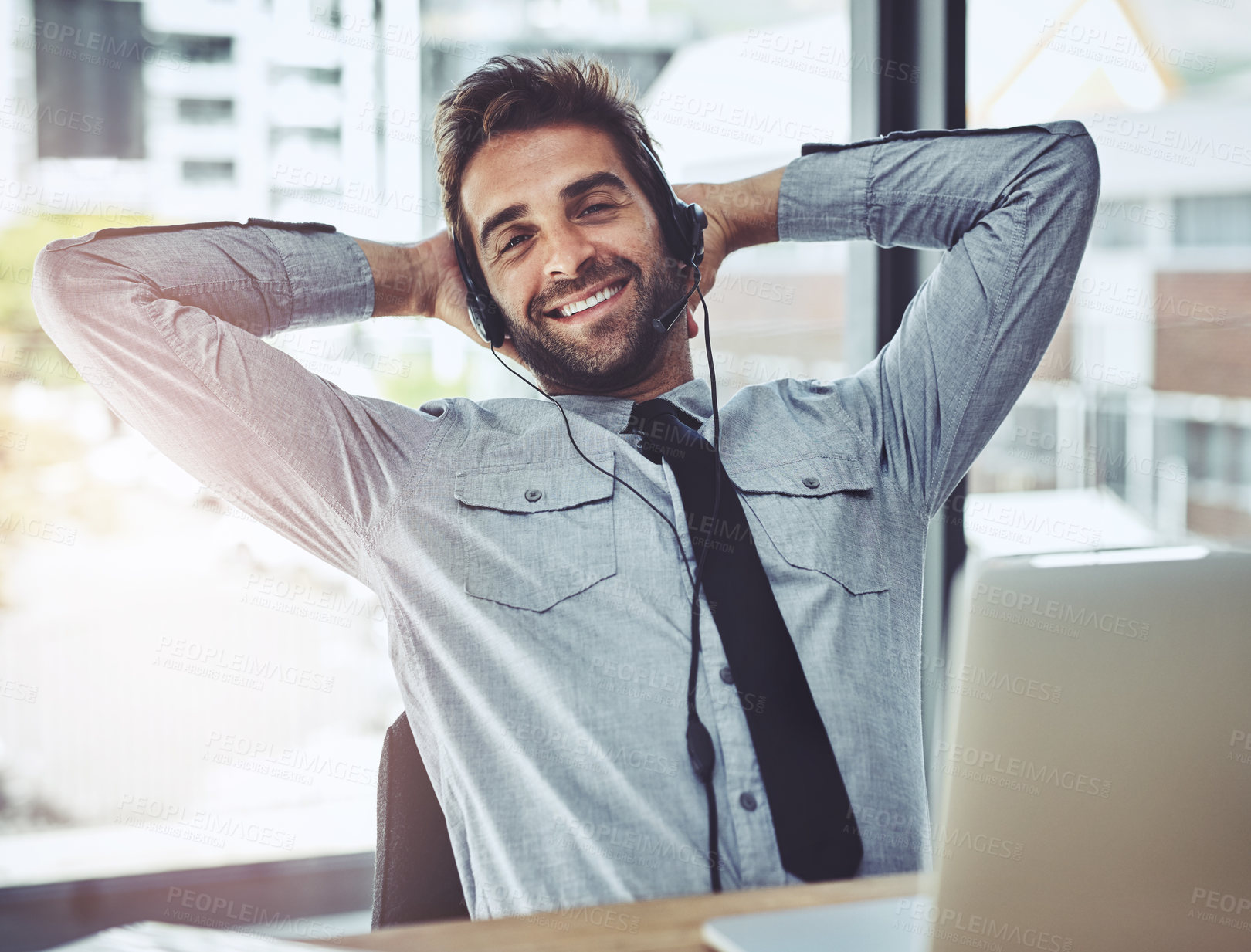 Buy stock photo Happy businessman, relax and portrait in call center for customer service, support or telemarketing break at office. Friendly man person, consultant or agent smiling and relaxing with hands on head