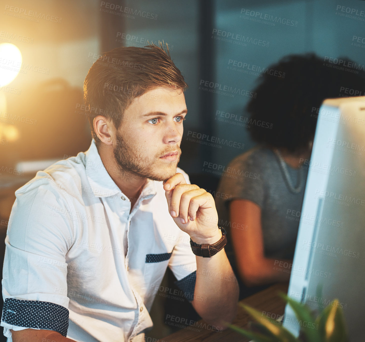 Buy stock photo Cropped shot of a young designer working late at the office