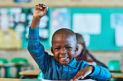Buy stock photo Cropped shot of an elementary school boy hand raised in the classroom