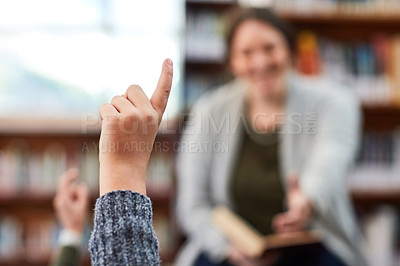 Buy stock photo Cropped shot of elementary school kids hand raised in the library