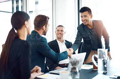 Buy stock photo Shot of businesspeople having a meeting in a boardroom