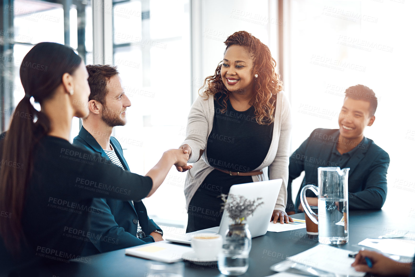 Buy stock photo Onboarding, welcome and business people with a handshake in a meeting for a partnership. Happy, thank you and women shaking hands in an interview for b2b, networking or agreement at a legal company