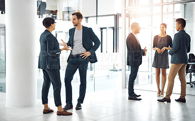 Buy stock photo Discussion, team and business people in office lobby plan finance investment for capital gain. Meeting, conversation and group of financial advisors briefing for company revenue, dividend or profit.