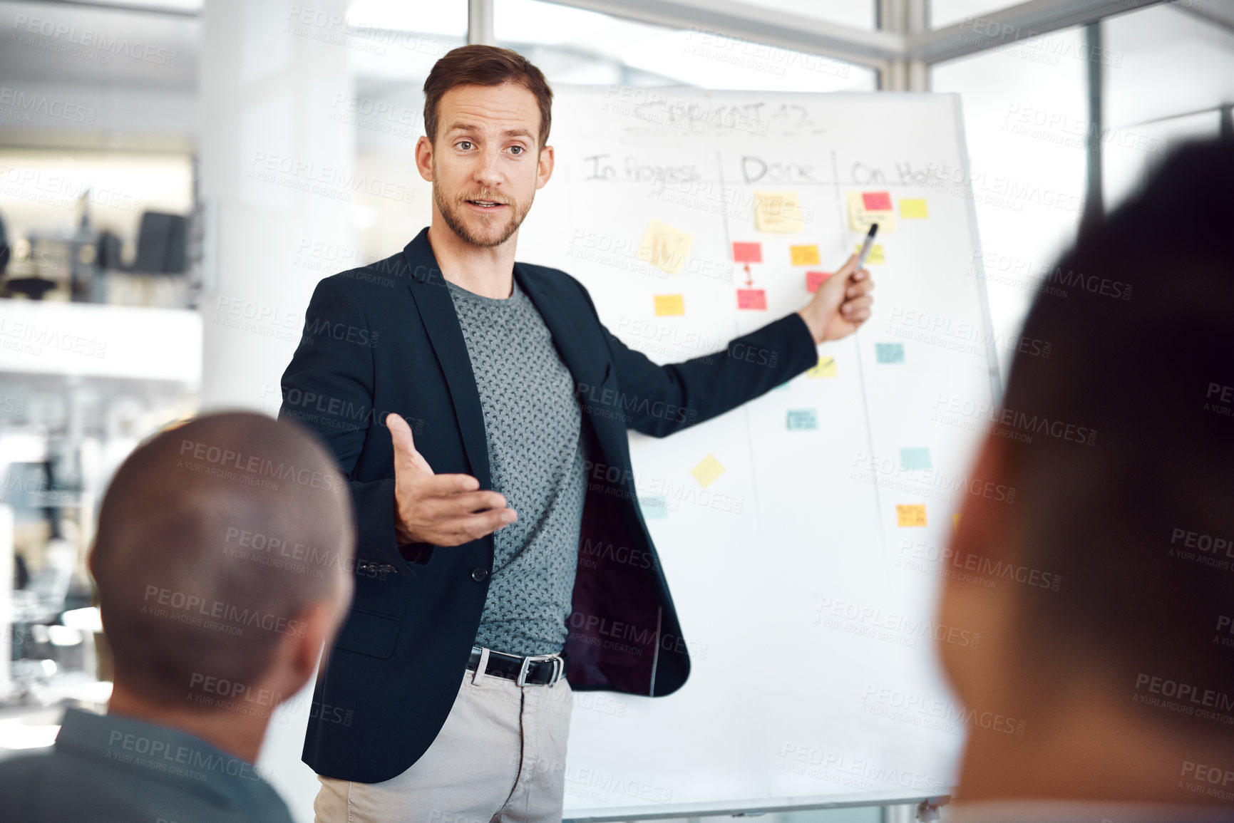 Buy stock photo Man, workshop and sticky notes on whiteboard for planning, timeline and employee engagement in office. Speaker, presentation and group training in boardroom for advice, collaboration and instruction