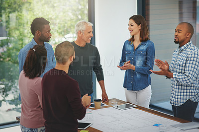 Buy stock photo Cropped shot of a group of architects applauding during a meeting in the boardroom