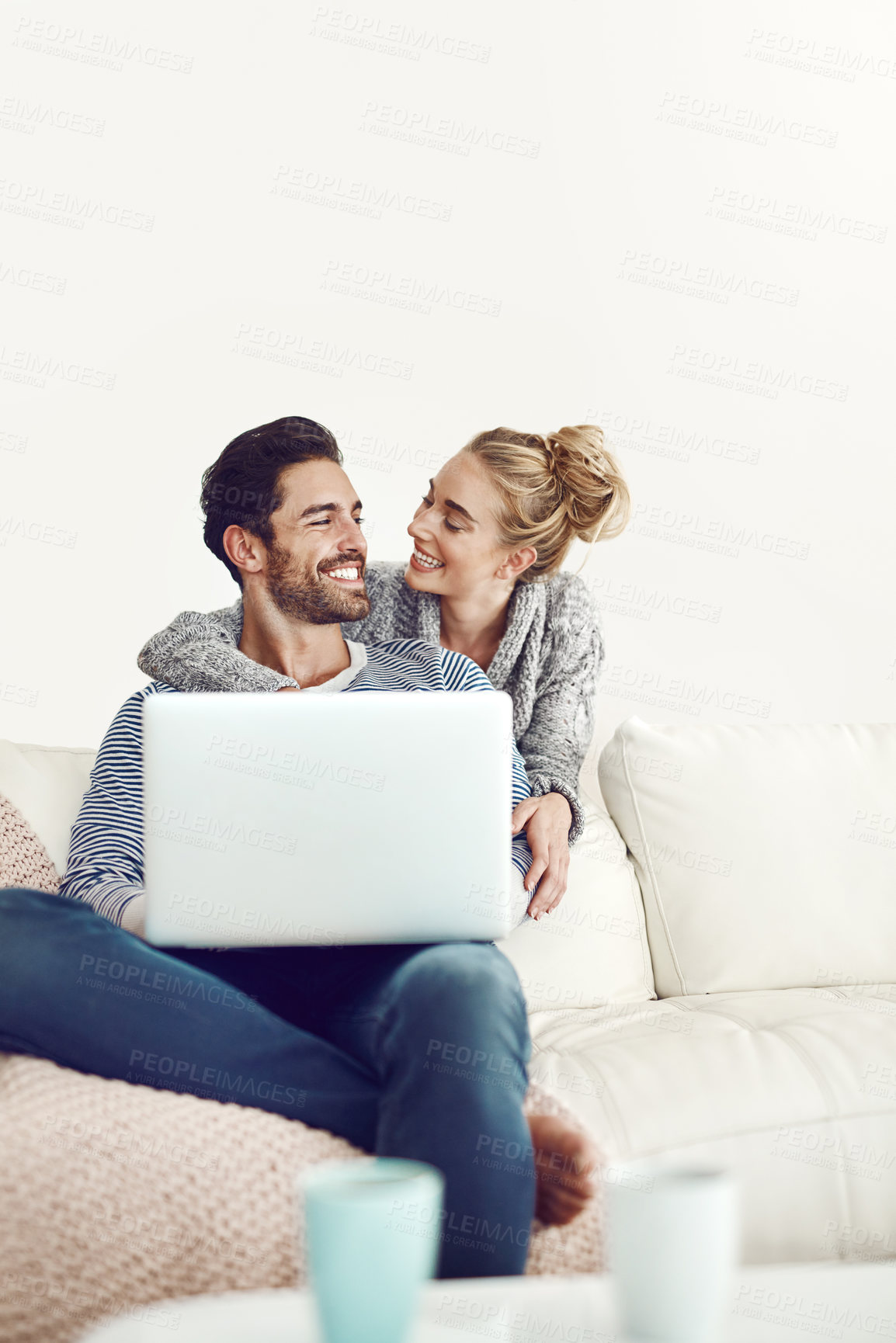 Buy stock photo Happy couple, space or laptop for bonding, choice or movie streaming online on sofa in living room. Home, internet or people relax on social network app, digital website or technology for mockup