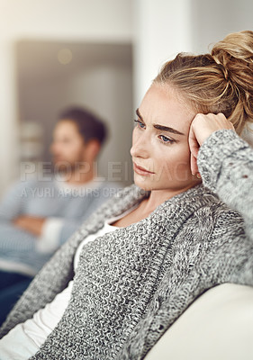 Buy stock photo Argument, stress and sad woman in a fight with her boyfriend in the living room of their apartment. Divorce, depression and young female person with conflict or breakup i couple therapy for marriage