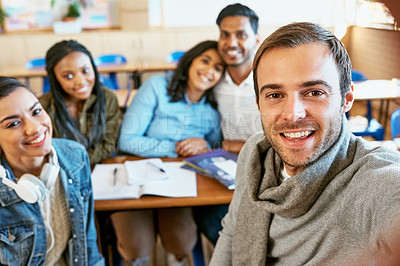 Buy stock photo Cropped portrait of a group of young university students sitting in class