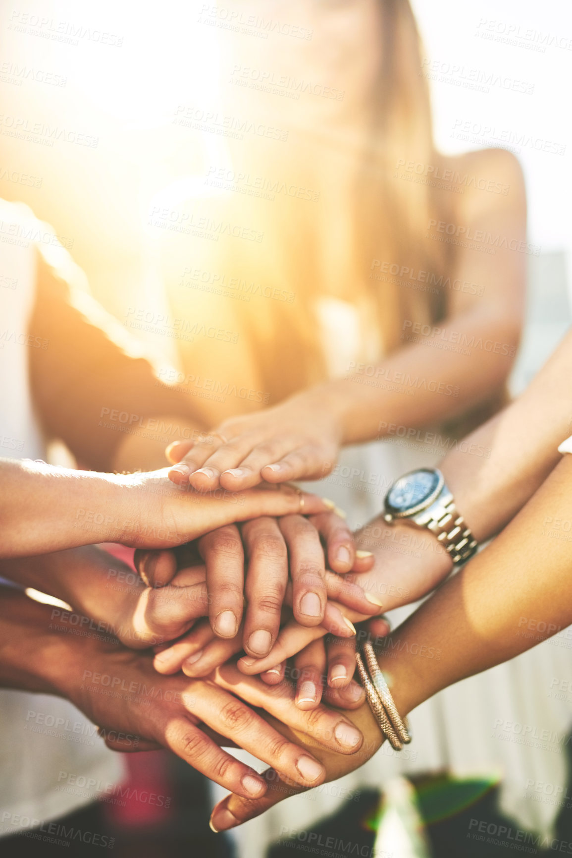 Buy stock photo Group, people and stack of hands for solidarity, celebration and success for vacation outdoor. Friends, men or women with huddle together for support, motivation and travel in city of Brazil by flare