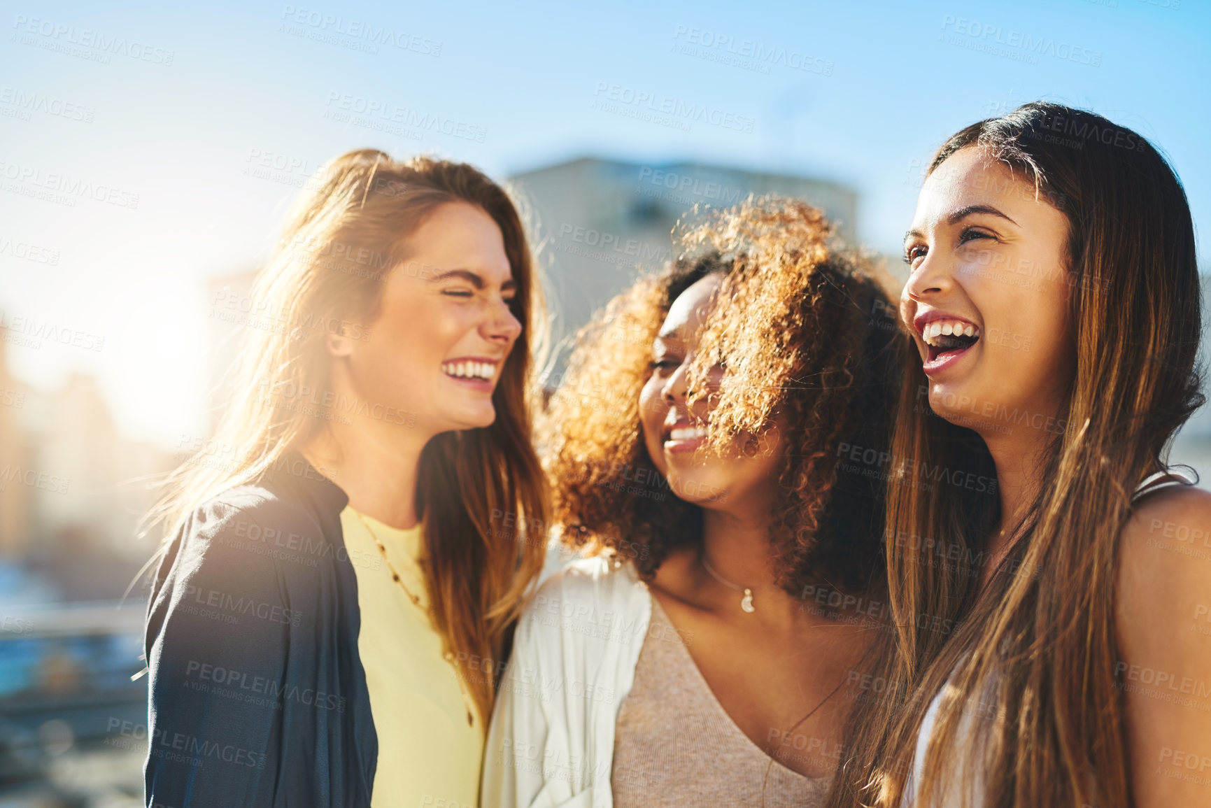 Buy stock photo Laughing, hug and funny with friends in city for bonding, happy and spring break. Students, summer vacation and college freshman with women in new york together for solidarity, support and lens flare