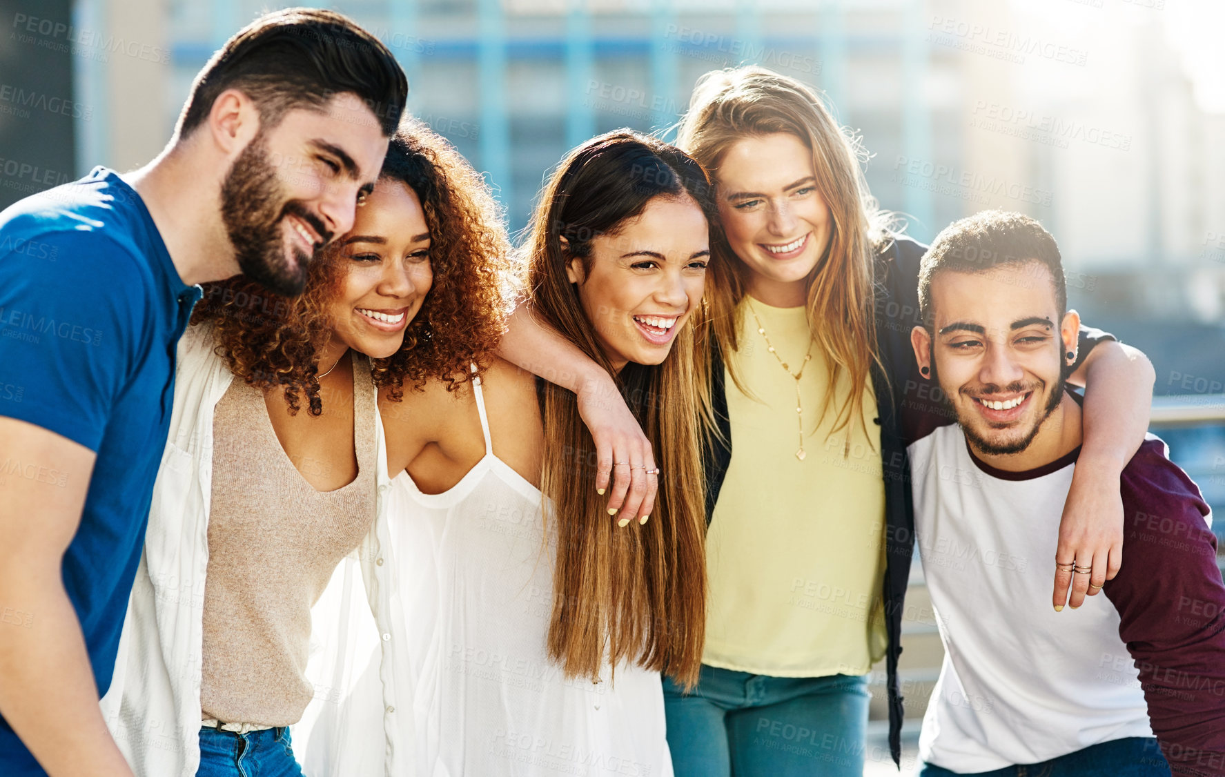 Buy stock photo Shot of young friends spending the day outside