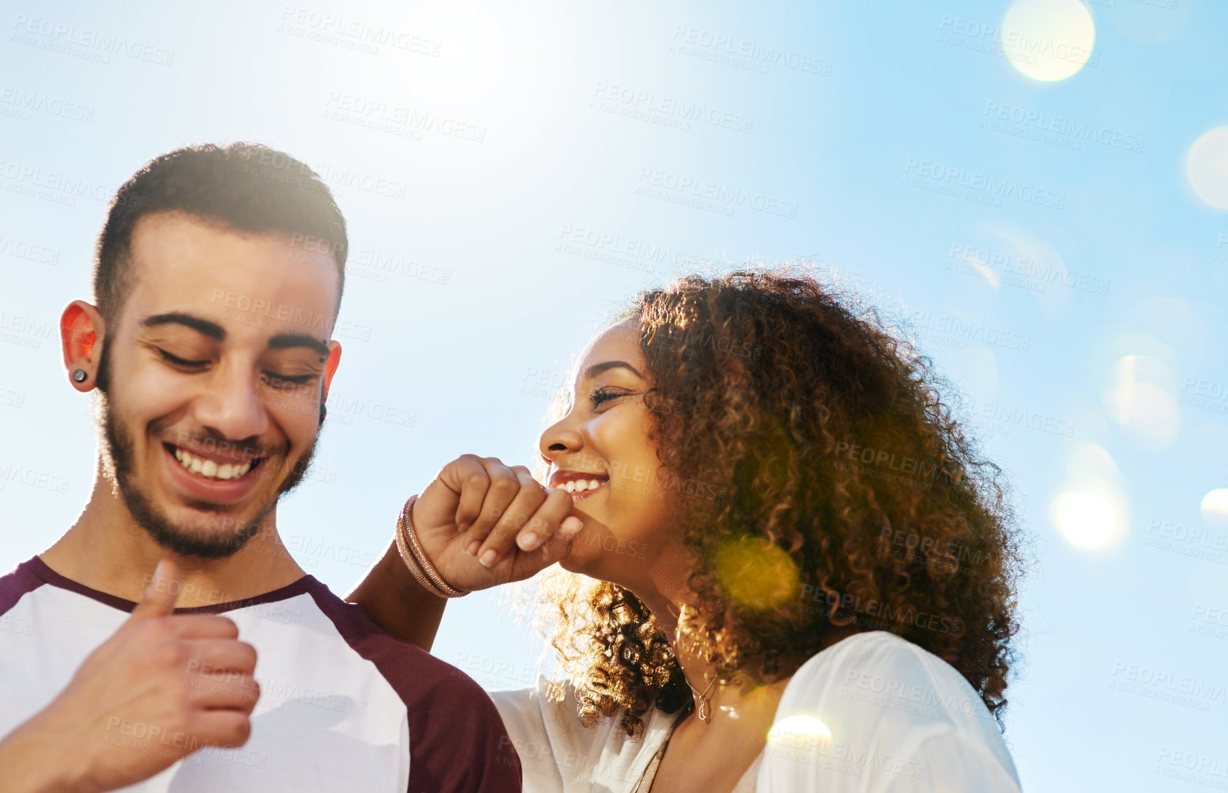 Buy stock photo Shot of a young couple outside